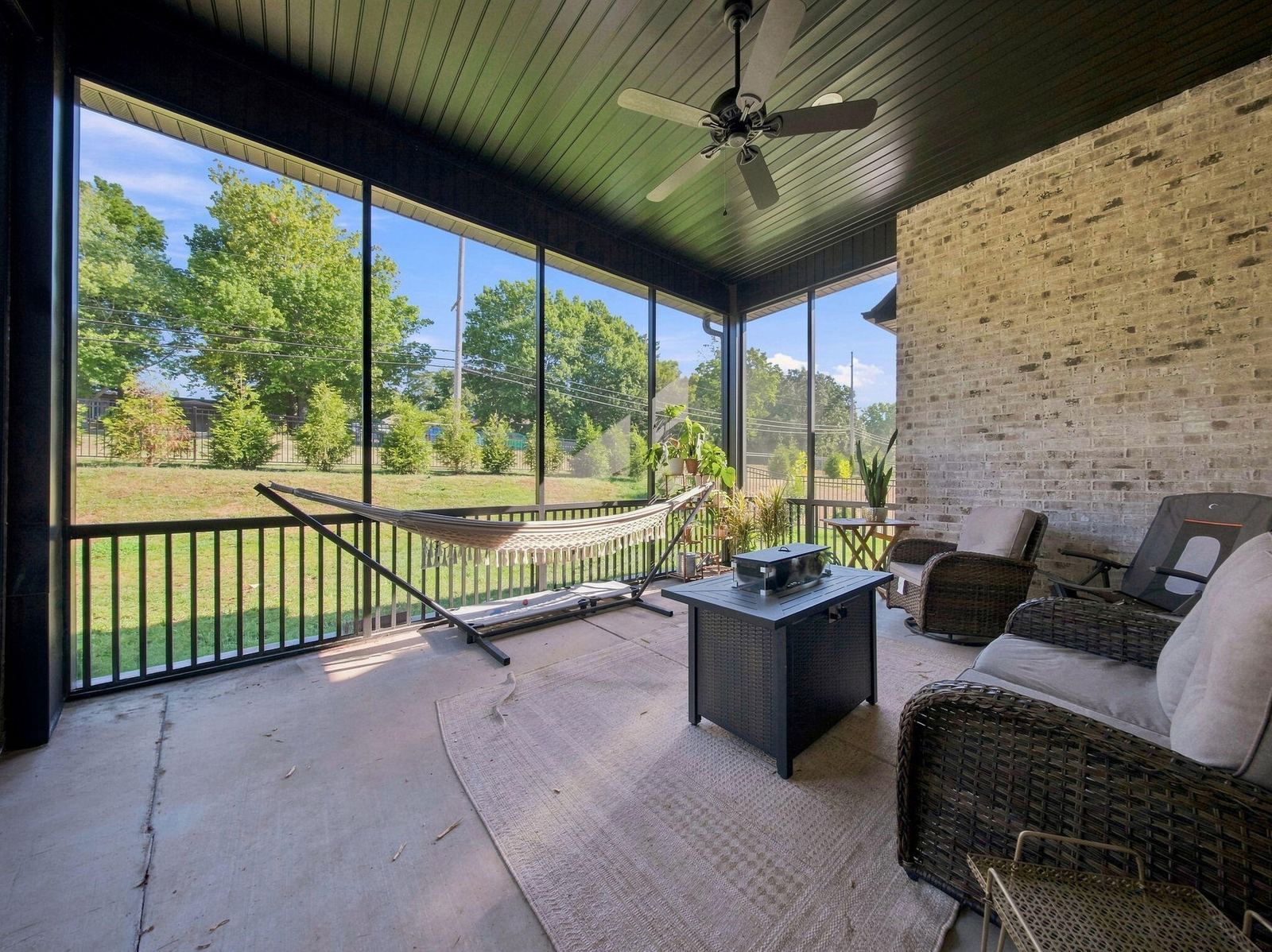 52-web-or-mls-back porch 1 at 3925 E Woodhue Street, Springfield, MO 65802