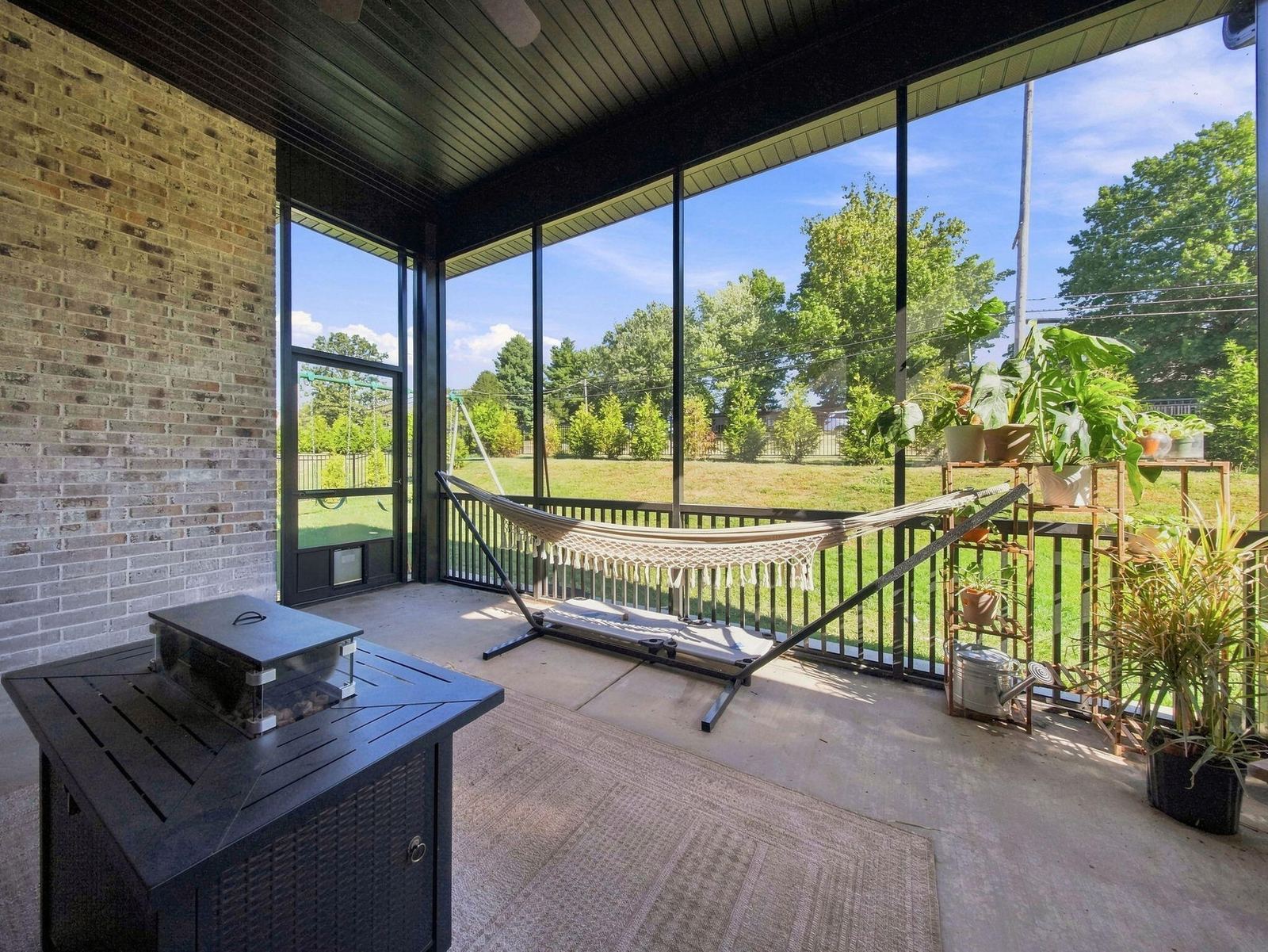 56-web-or-mls-back porch 3 at 3925 E Woodhue Street, Springfield, MO 65802