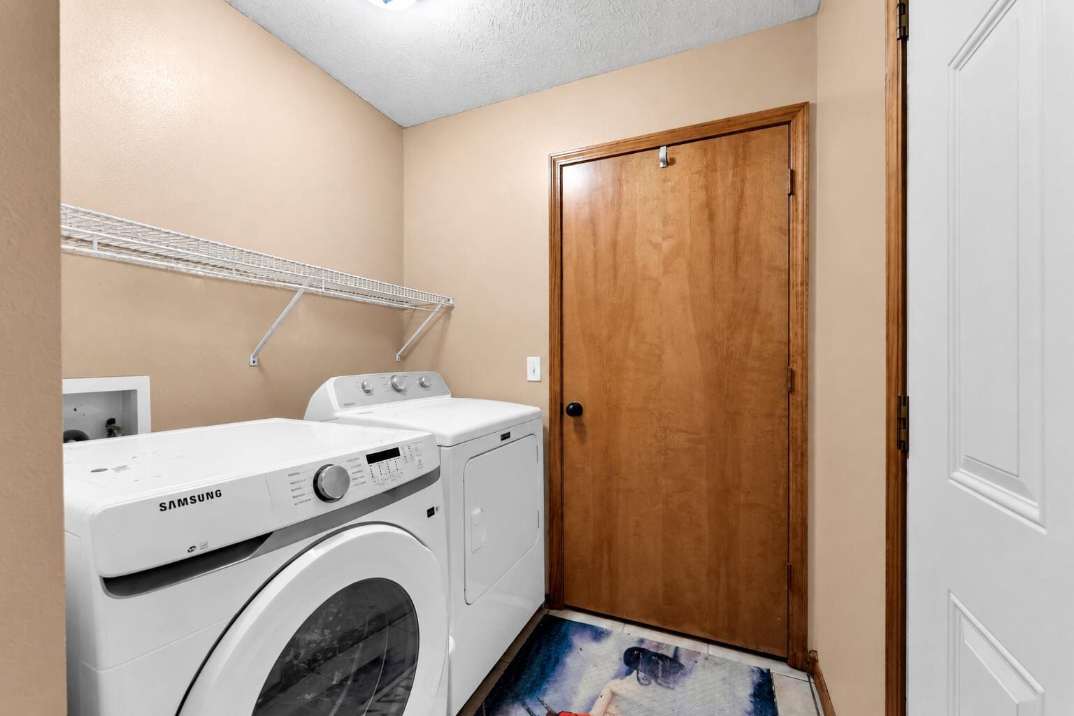 Empty-Shelf Laundry Room Interior at 828 S Natalie Avenue, Springfield, MO 65802